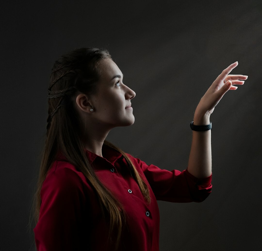 Studio portrait of a Belgian businesswoman in her 30s wearing a blazer