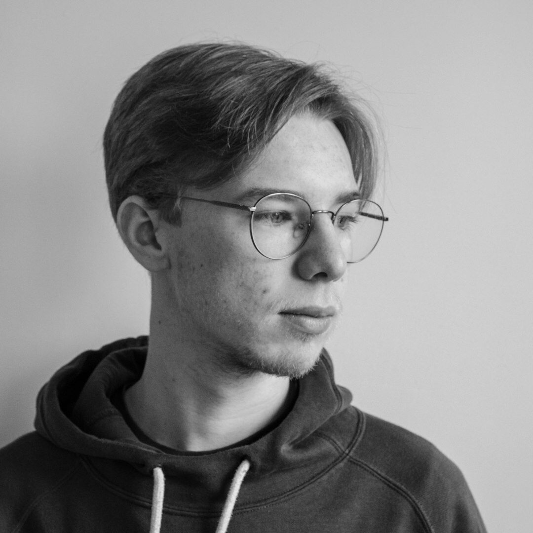 Studio portrait of a senior Belgian businessman in his 50s with glasses