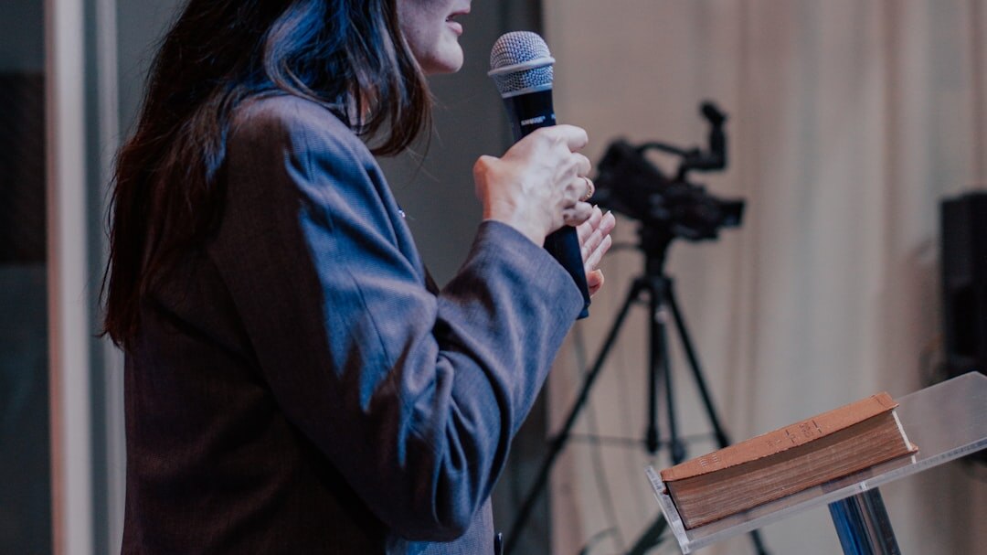 speaker presenting on stage