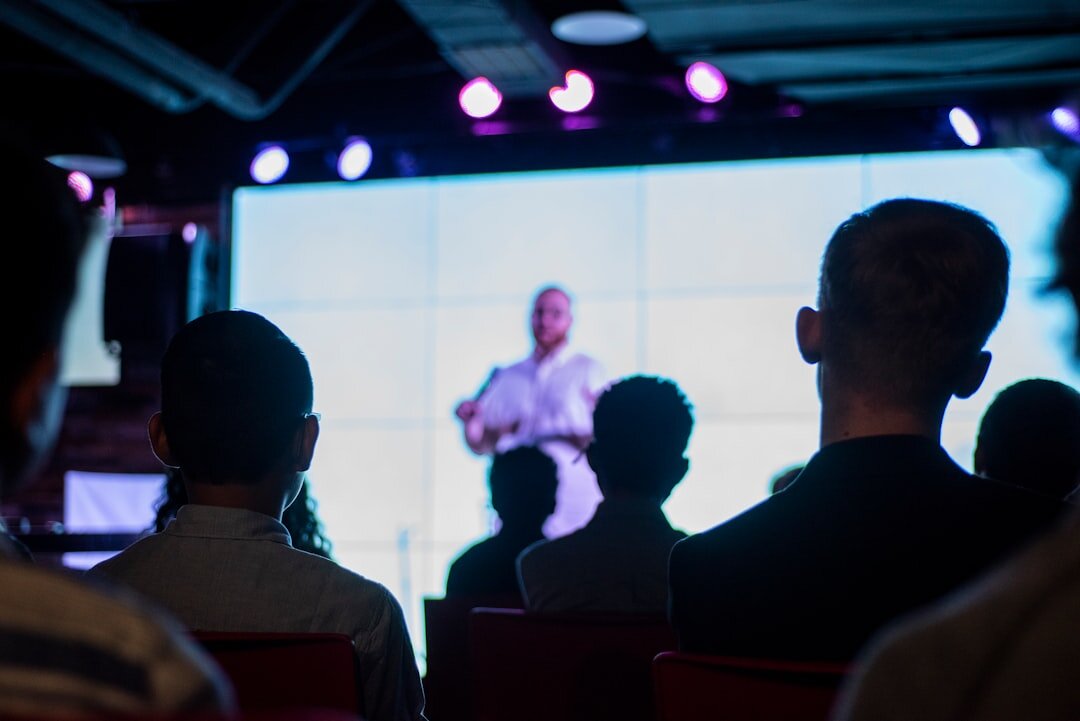 speaker presenting on stage